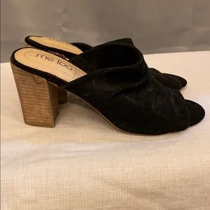 Backless heeled miles